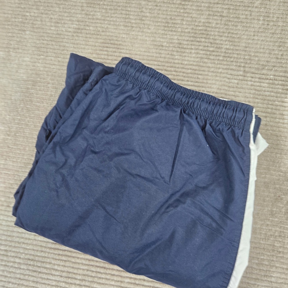 Nike Men Large Navy Blue White Stripe Lined Cargo Pocket Windbreaker Track Pants